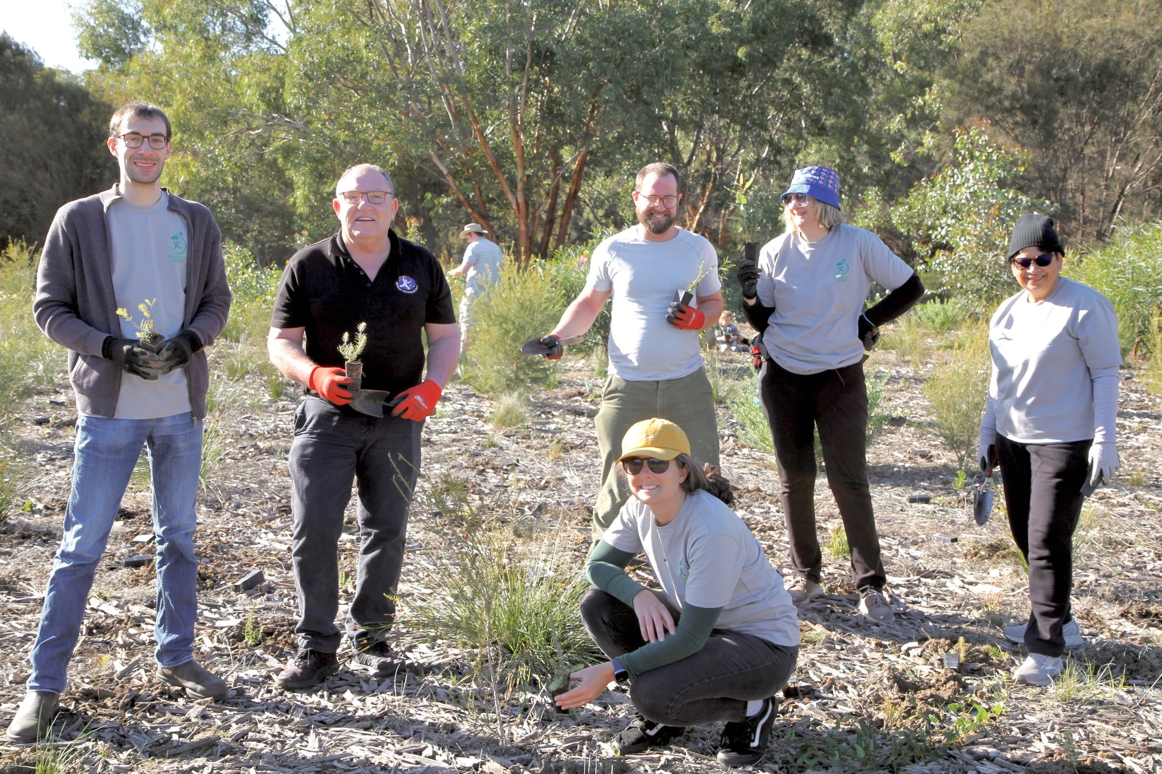 Local residents participating in the Garvey Park revegetation day