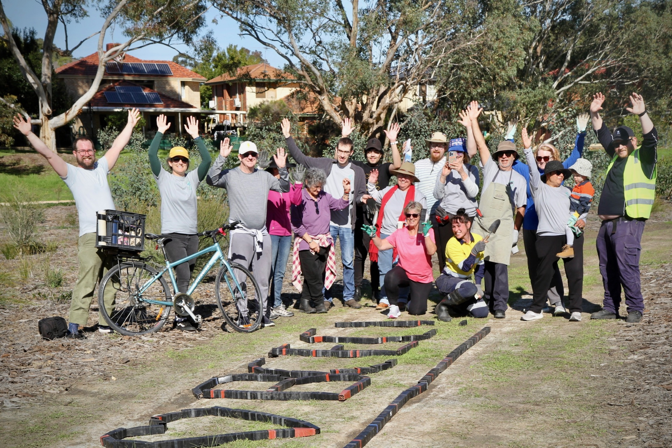 Volunteers tending young native plants at Garvey Park
