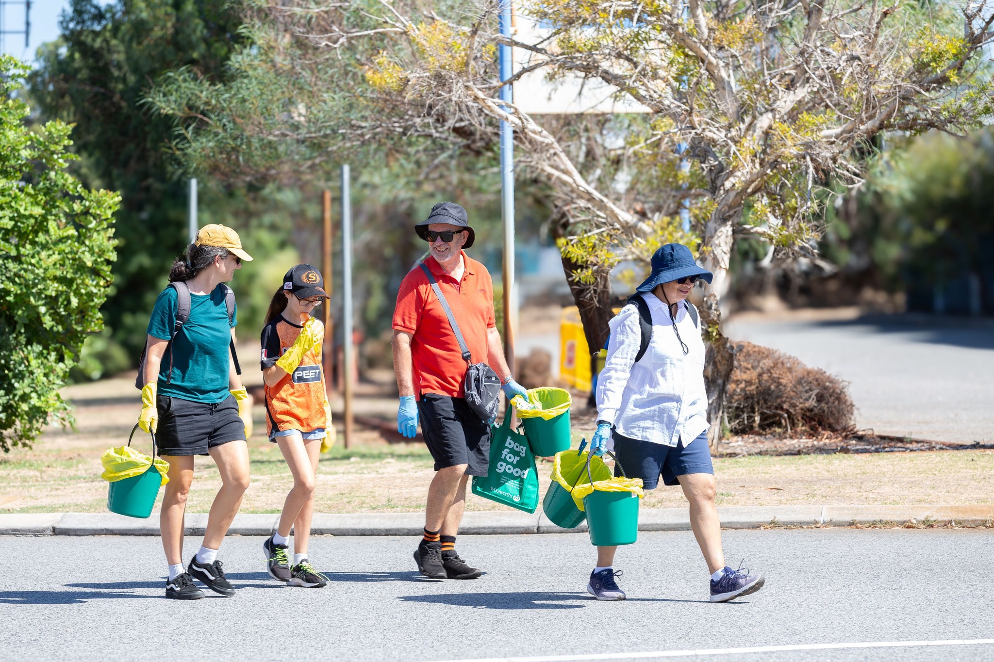 Volunteers collecting litter at a Less Mess clean-up