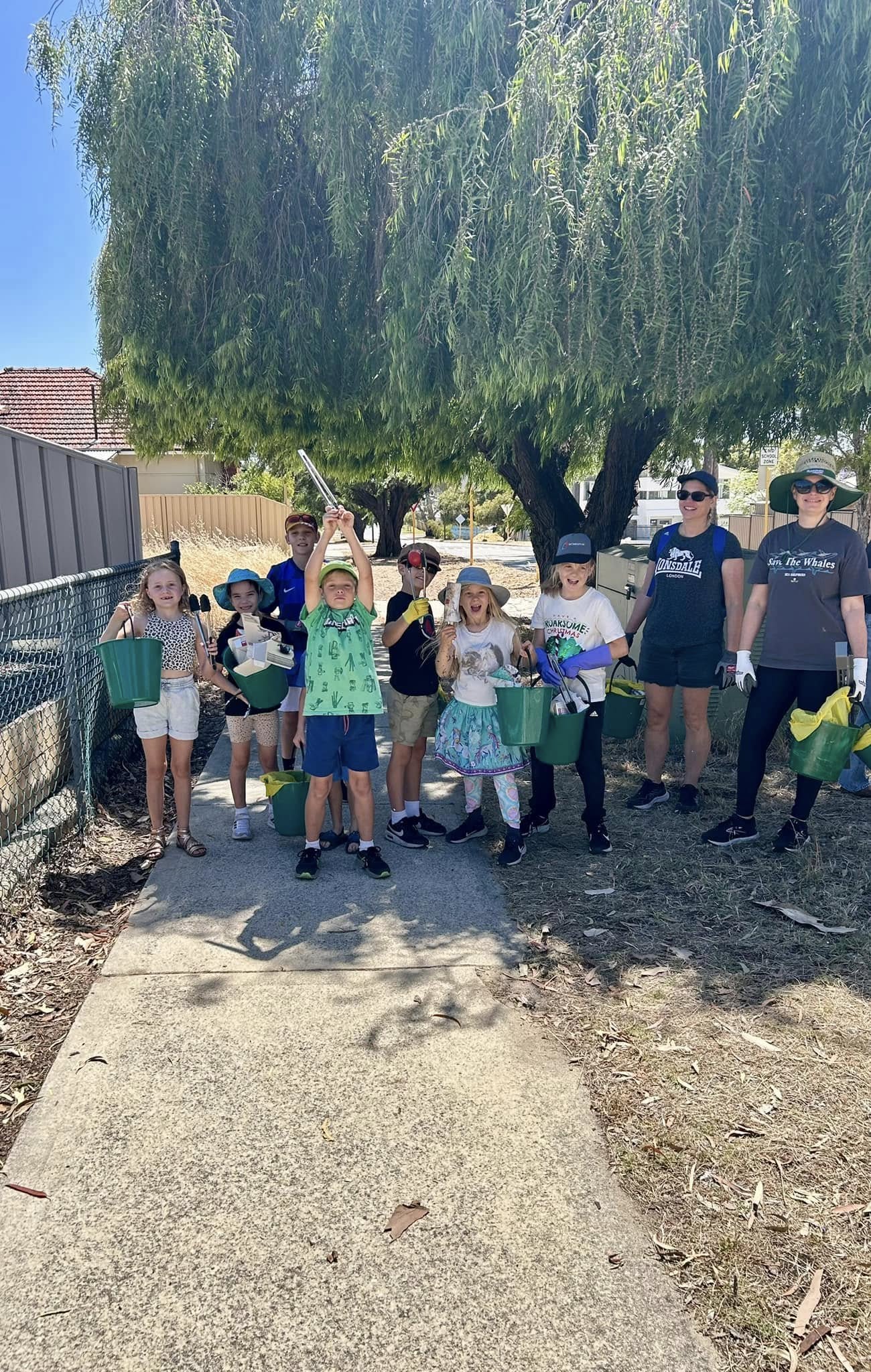Children taking part in a Less Mess clean-up