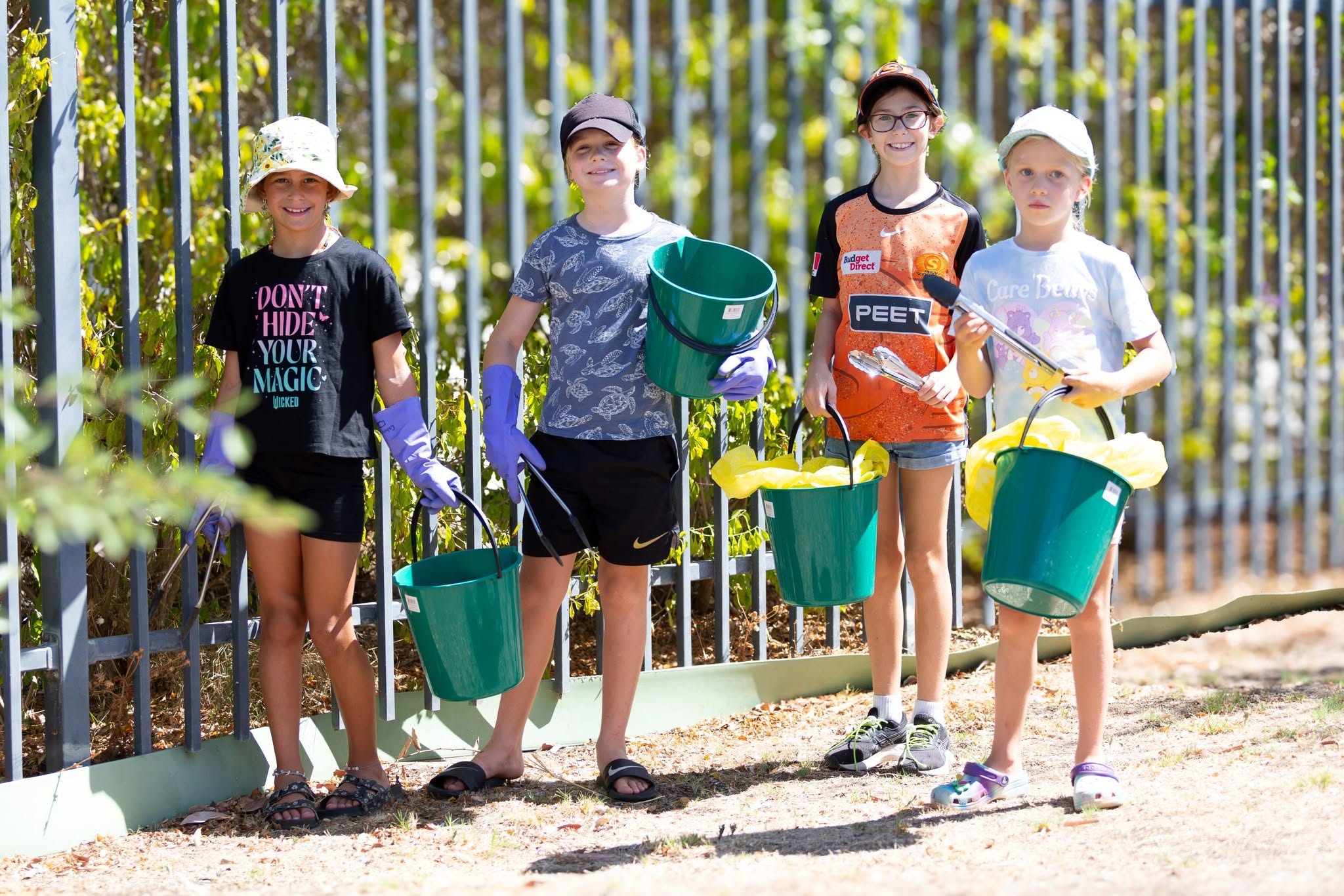 Children participating in a clean-up event